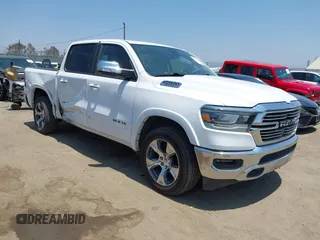 2020 Ram 1500 Laramie with VIN 1C6SRFJT5LN243327, listed as a IAAI auction lot 42756017 with 54,091 mi miles and . Bid and sale history available at DreamBid. Image 1.