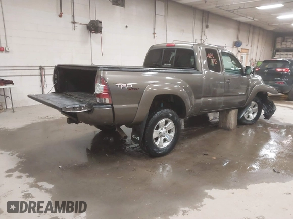 2013 Toyota Tacoma with VIN 5TFUU4EN3DX055489, listed as a IAAI auction lot 41247213 with 58,570 mi miles and . Bid and sale history available at DreamBid. Image 4.