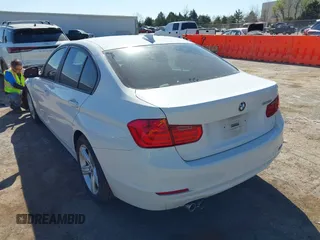 2013 BMW 3 Series 328i with VIN WBA3A5G52DNP18714, listed as a IAAI auction lot 41844082 with 104,867 mi miles and . Bid and sale history available at DreamBid. Image 3.