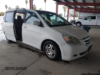 2007 Honda Odyssey EX-L z VIN 5FNRL38767B143631, wystawiony jako IAAI lot #41809401 z przebiegiem 155 894 mil mil oraz . Historia ofert i sprzedaży dostępna na DreamBid. Obrazek 1.