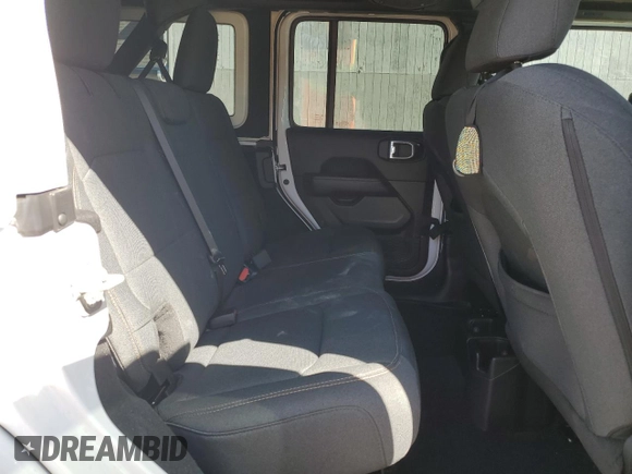 2024 Jeep Wrangler Sahara with VIN 1C4PJXEN7RW297948, listed as a Copart auction lot 54656795 with 12,292 mi miles and Salvage title. Bid and sale history available at DreamBid. Image 11.