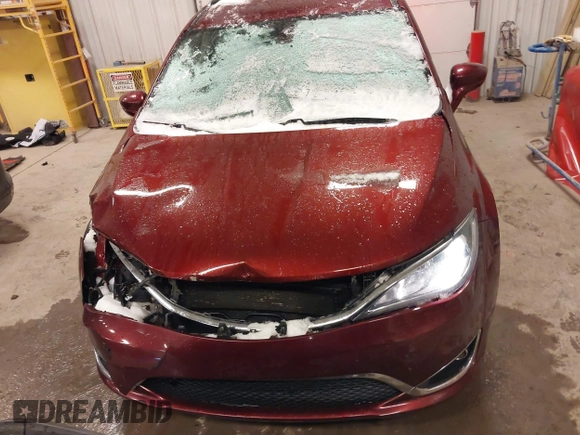 2018 Chrysler Pacifica Touring L Plus z VIN 2C4RC1EG5JR227511, wystawiony jako IAAI lot #41344075 z przebiegiem 86 860 mil mil oraz . Historia ofert i sprzedaży dostępna na DreamBid. Obrazek 12.