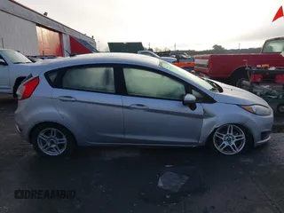 2019 Ford Fiesta SE z VIN 3FADP4EJ7KM147864, wystawiony jako IAAI lot #41692160 z przebiegiem 87 417 mil mil oraz . Historia ofert i sprzedaży dostępna na DreamBid. Obrazek 13.