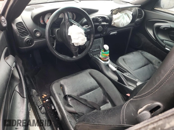2004 Porsche 911 Carrera S z VIN WP0CB29914S676407, wystawiony jako Copart lot #73391713 z przebiegiem Nie podano mil oraz Szkoda całkowita • Salvage title. Historia ofert i sprzedaży dostępna na DreamBid. Obrazek 8.
