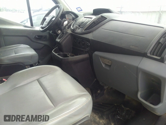 2015 Ford Transit Passenger XL z VIN 1FBAX2CG3FKA97085, wystawiony jako IAAI lot #42210744 z przebiegiem 81 911 mil mil oraz . Historia ofert i sprzedaży dostępna na DreamBid. Obrazek 5.