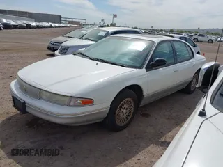 1997 Chrysler LHS z VIN 2C3HC56F0VH558148, wystawiony jako IAAI lot #42341320 z przebiegiem 144 372 mil mil oraz . Historia ofert i sprzedaży dostępna na DreamBid. Obrazek 2.