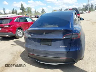 2024 Tesla Model Y Long Range z VIN 7SAYGAEE0RF074822, wystawiony jako IAAI lot #42098821 z przebiegiem Nie podano mil oraz . Historia ofert i sprzedaży dostępna na DreamBid. Obrazek 16.