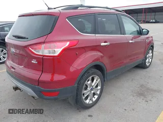 2014 Ford Escape SE with VIN 1FMCU9G90EUD89356, listed as a IAAI auction lot 41841229 with 148,997 mi miles and . Bid and sale history available at carsss.com. Image 4.