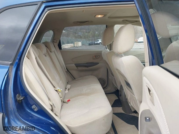 2006 Hyundai Tucson GLS with VIN KM8JN72D06U325677, listed as a IAAI auction lot 42065674 with 168,044 mi miles. Bid and sale history available at carsss.com. Image 8.