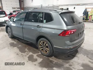 2022 Volkswagen Tiguan S z VIN 3VV0B7AX2NM042934, wystawiony jako IAAI lot #42172199 z przebiegiem 71 367 mil mil oraz . Historia ofert i sprzedaży dostępna na DreamBid. Obrazek 3.