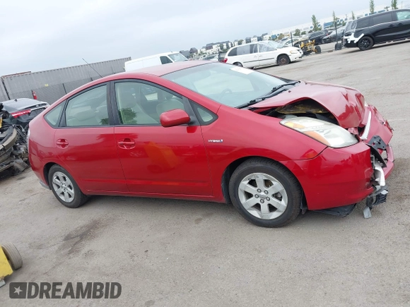 2007 Toyota Prius z VIN JTDKB20U673288178, wystawiony jako IAAI lot #42362578 z przebiegiem 104 388 mil mil oraz . Historia ofert i sprzedaży dostępna na DreamBid. Obrazek 13.