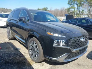 2023 Hyundai Santa Fe Calligraphy z VIN 5NMS54AL7PH577709, wystawiony jako IAAI lot #41771355 z przebiegiem 16 786 mil mil oraz . Historia ofert i sprzedaży dostępna na DreamBid. Obrazek 1.