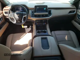 2023 Chevrolet Tahoe Premier with VIN 1GNSCSKD6PR119132, listed as a Copart auction lot 74594664 with 27,716 mi miles and Salvage title. Bid and sale history available at DreamBid. Image 8.