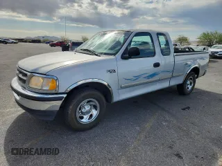 1997 Ford F-150 with VIN 2FTDX1767VCA65098, listed as a Copart auction lot 63154575 with 80,797 mi miles and Clean title. Bid and sale history available at DreamBid. Image 1.