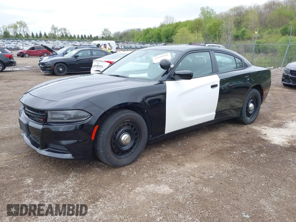 2019 Dodge Charger Police with VIN 2C3CDXKT5KH622663, listed as a IAAI auction lot 42184918 with 86,946 mi miles and . Bid and sale history available at DreamBid. Image 17.