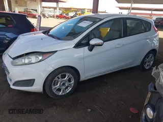 2014 Ford Fiesta SE with VIN 3FADP4EJ7EM111919, listed as a IAAI auction lot 42063116 with 154,137 mi miles and . Bid and sale history available at DreamBid. Image 2.