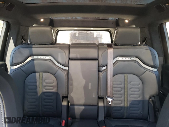 2023 Rivian R1S Adventure with VIN 7PDSGABA3PN012584, listed as a Copart auction lot 47557575 with 8,633 mi miles and Salvage Title. Bid and sale history available at carsss.com. Image 10.
