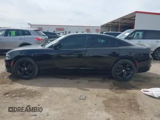 2015 Dodge Charger SXT z VIN 2C3CDXHG7FH777845, wystawiony jako IAAI lot #41791185 z przebiegiem 109 978 mil mil oraz . Historia ofert i sprzedaży dostępna na DreamBid. Obrazek 14.