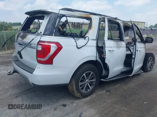 2019 Ford Expedition XLT with VIN 1FMJU1JT1KEA72057, listed as a IAAI auction lot 42674209 with Not provided miles and . Bid and sale history available at DreamBid. Image 4.