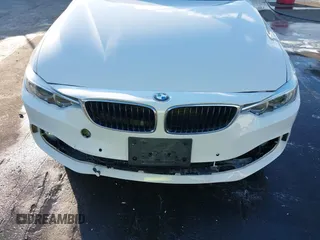 2014 BMW 4 Series 428i with VIN WBA3N7C50EF718812, listed as a IAAI auction lot 41349128 with 67,581 mi miles and . Bid and sale history available at carsss.com. Image 12.