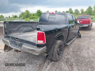 2013 Ram 2500 Laramie z VIN 3C6UR5FL0DG516938, wystawiony jako IAAI lot #39916278 z przebiegiem 198 845 mil mil oraz . Historia ofert i sprzedaży dostępna na DreamBid. Obrazek 4.