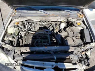 2005 Mazda Tribute i with VIN 4F2YZ02Z85KM31234, listed as a Copart auction lot 68669434 with 211,921 mi miles and Salvage Title. Bid and sale history available at carsss.com. Image 12.