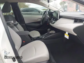 2021 Toyota Corolla Hybrid LE with VIN JTDEAMDE6MJ008815, listed as a IAAI auction lot 41586643 with 7,548 mi miles. Bid and sale history available at carsss.com. Image 5.
