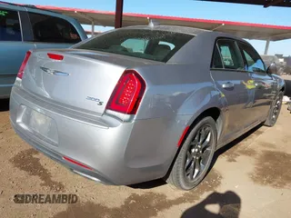 2015 Chrysler 300 with VIN 2C3CCAGG0FH887573, listed as a IAAI auction lot 41111962 with 84,286 mi miles. Bid and sale history available at carsss.com. Image 4.