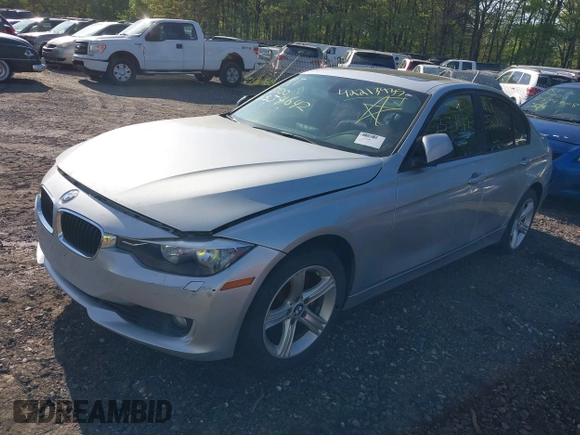 2013 BMW 3 Series 328i xDrive with VIN WBA3B5G56DNS02207, listed as a IAAI auction lot 42213935 with Not provided miles and . Bid and sale history available at DreamBid. Image 2.