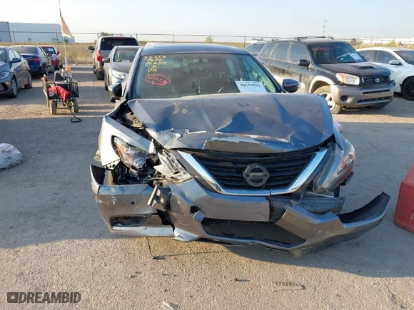 2016 Nissan Altima 2.5 S with VIN 1N4AL3AP5GC234612, listed as a IAAI auction lot 40619081 with 129,177 mi miles. Bid and sale history available at carsss.com. Image 6.