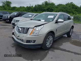 2015 Cadillac SRX Performance Collection with VIN 3GYFNCE34FS639168, listed as a IAAI auction lot 42191995 with 101,358 mi miles and . Bid and sale history available at DreamBid. Image 2.