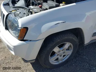 2006 Jeep Grand Cherokee Laredo with VIN 1J4GR48K66C255979, listed as a IAAI auction lot 40365800 with 177,982 mi miles. Bid and sale history available at carsss.com. Image 6.