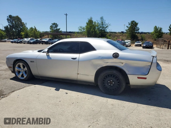 2012 Dodge Challenger R/T z VIN 2C3CDYBT0CH259731, wystawiony jako Copart lot #58033035 z przebiegiem 142 427 mil mil oraz Czysty tytuł • Clean title. Historia ofert i sprzedaży dostępna na DreamBid. Obrazek 2.