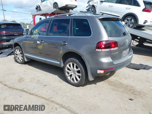 2010 Volkswagen Touareg VR6 with VIN WVGBF7A96AD002466, listed as a IAAI auction lot 41709052 with 204,819 mi miles and . Bid and sale history available at DreamBid. Image 3.