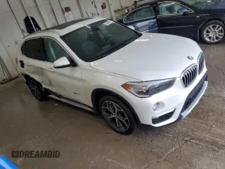 2018 BMW X1 xDrive28i с VIN WBXHT3C32J5K32348, выставлен на аукционе Copart как лот 53489825 с пробегом 61 972 миль миль и Списание • Salvage title. История ставок и продаж доступна на DreamBid. Изображение 4.