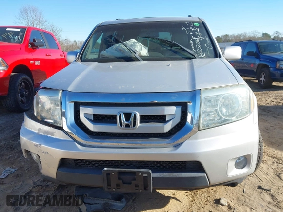 2009 Honda Pilot Touring with VIN 5FNYF48979B008851, listed as a IAAI auction lot 41252736 with 183,292 mi miles and . Bid and sale history available at carsss.com. Image 12.