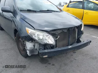 2010 Toyota Corolla with VIN 1NXBU4EE3AZ169217, listed as a IAAI auction lot 42148293 with 205,965 mi miles. Bid and sale history available at carsss.com. Image 12.