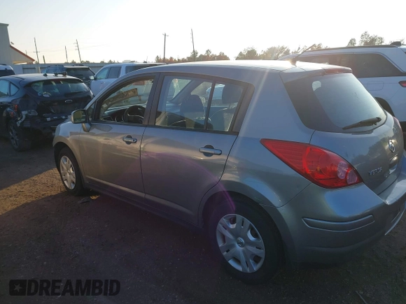 2012 Nissan Versa S with VIN 3N1BC1CP0CK221953, listed as a IAAI auction lot 41066775 with 152,989 mi miles. Bid and sale history available at carsss.com. Image 3.