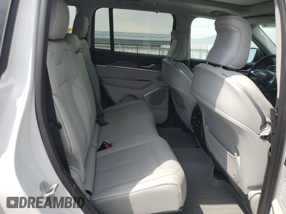 2023 Jeep Grand Cherokee Overland with VIN 1C4RJHDG9PC517056, listed as a Copart auction lot 54929955 with 18,418 mi miles and Salvage title. Bid and sale history available at DreamBid. Image 11.