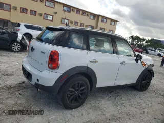 2013 MINI Countryman with VIN WMWZB3C5XDWM31715, listed as a Copart auction lot 57028565 with 95,453 mi miles and Salvage title. Bid and sale history available at DreamBid. Image 3.