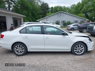 2015 Volkswagen Jetta SE z VIN 3VWD17AJ8FM323116, wystawiony jako IAAI lot #42246679 z przebiegiem 175 446 mil mil oraz . Historia ofert i sprzedaży dostępna na DreamBid. Obrazek 14.