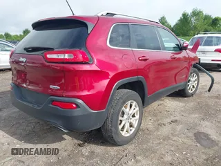 2015 Jeep Cherokee Latitude z VIN 1C4PJMCS0FW534959, wystawiony jako IAAI lot #42657381 z przebiegiem 114 577 mil mil oraz . Historia ofert i sprzedaży dostępna na DreamBid. Obrazek 4.