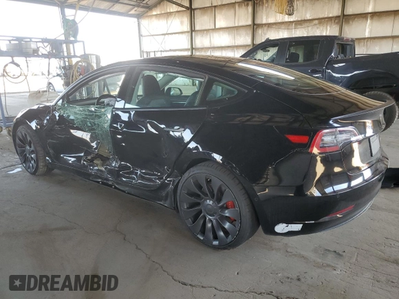 2021 Tesla Model 3 Performance with VIN 5YJ3E1EC0MF060360, listed as a Copart auction lot 43315195 with 28,726 mi miles and Salvage Title. Bid and sale history available at DreamBid. Image 2.