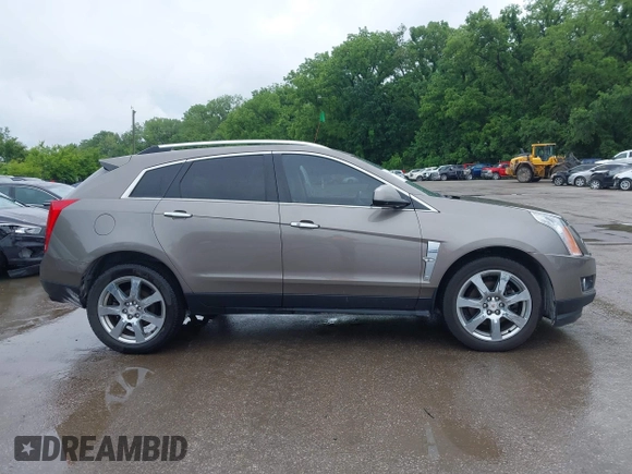 2012 Cadillac SRX Premium Collection z VIN 3GYFNCE3XCS620507, wystawiony jako IAAI lot #42348835 z przebiegiem 184 737 mil mil oraz . Historia ofert i sprzedaży dostępna na DreamBid. Obrazek 13.