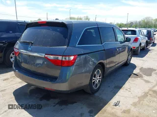 2011 Honda Odyssey EX-L with VIN 5FNRL5H62BB071404, listed as a IAAI auction lot 42196826 with 278,657 mi miles and . Bid and sale history available at carsss.com. Image 4.
