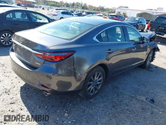 2020 Mazda 6 Sport with VIN JM1GL1UM7L1527203, listed as a IAAI auction lot 41378087 with 57,174 mi miles and . Bid and sale history available at DreamBid. Image 4.