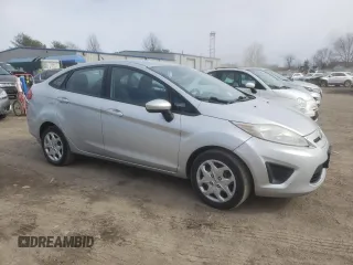 2012 Ford Fiesta SE with VIN 3FADP4BJ3CM114043, listed as a Copart auction lot 46254685 with 58,457 mi miles and Clean Title. Bid and sale history available at DreamBid. Image 4.