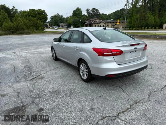 2017 Ford Focus SE with VIN 1FADP3F28HL28437, listed as a Copart auction lot 57904285 with 72,966 mi miles and Clean title. Bid and sale history available at DreamBid. Image 3.