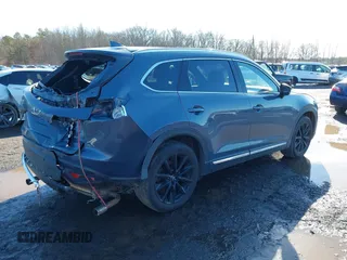 2021 Mazda CX-9 Grand Touring with VIN JM3TCBDY5M0506632, listed as a IAAI auction lot 41589264 with 50,026 mi miles and . Bid and sale history available at carsss.com. Image 4.