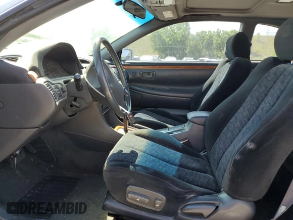 2002 Toyota Solara SE with VIN 2T1CF22P82C571603, listed as a Copart auction lot 61211805 with 157,570 mi miles and Salvage title. Bid and sale history available at DreamBid. Image 7.